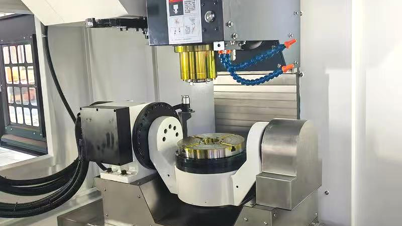 5-axis CNC machining center interior for complex multi-sided parts
